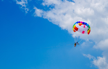 Fototapeta na wymiar parachute in the sky