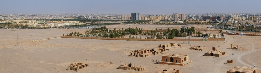 Panoramic view of ancient Zoroastrian building and modern architecture in Yazd city. View from tower of silence. Yadz, Iran.
