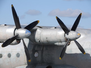 Naklejka na ściany i meble Close - up of old engine and propeller plane.