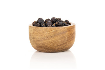 Lot of whole dry juniper berry seed isolated on white background