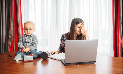 Mother works, kid helps her, motherhood problems