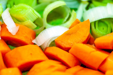 Close up of greens celery carrot cut