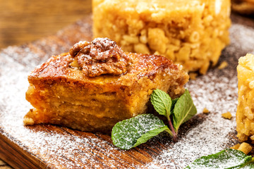 Slice of sweet classic layered cake Napoleon.