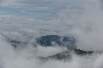 Fototapeta na wymiar The mountain with cloud and mist in rainy season at Phu tub berk , Petchaboon , Thailand