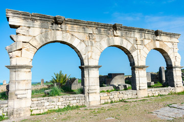 Fototapeta na wymiar Arches at the Roman Ruins of Volubilis in Morocco
