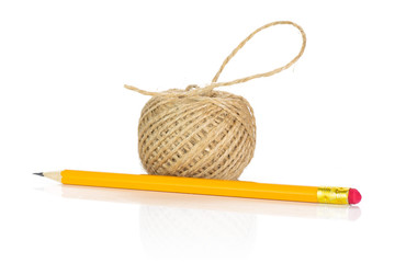 One whole sharpened yellow pencil with jute spool isolated on white background