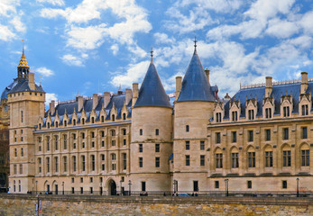 Fototapeta na wymiar Castle Conciergerie - former royal palace and prison. Conciergerie located on the west of the Cite Island and today it is part of Palais de Justice. Paris, France. 