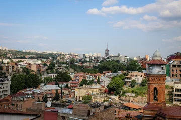 Deurstickers View of the city from the observation deck. The capital of Georgia is Tbilisi. Old city. The Kura River. Red roofs, low buildings. Panorama, architecture, urban © Sea_Inside_Soul