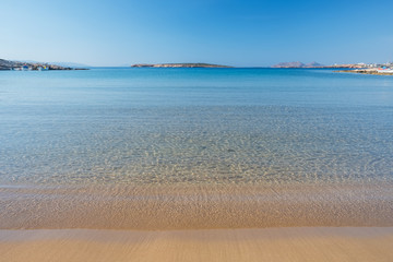Sandy beach with amazing tranquil water on Paros island, Greece.