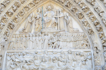 Fototapeta na wymiar PARIS-FRANCE-FEB 24, 2019: Notre Dame Cathedral Facade Close up detail at Paris, France.
