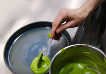 chef decorating the dish