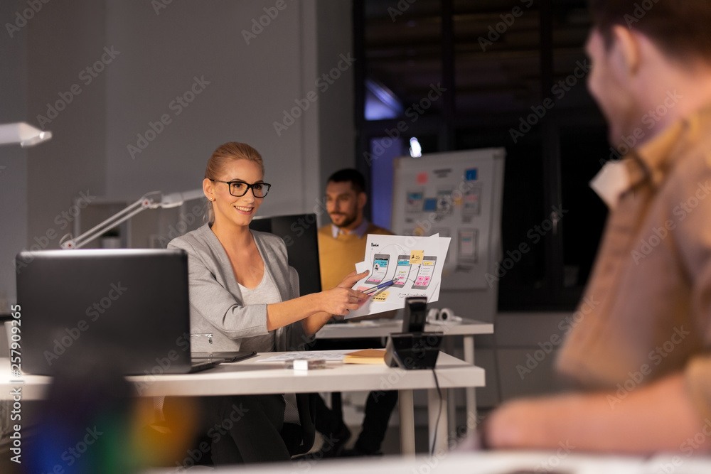 Poster business, deadline and technology concept - software developers discussing user interface design moc
