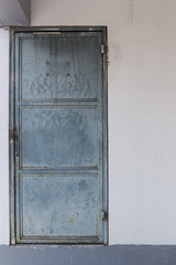 metal door on concrete wall
