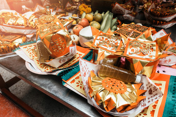 Golden chinese folded paper ghost and gods for burning, Ghost and gods money offering in the temple in Chinese temple.
