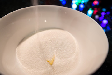 Mixing sugar with butter. Woman is cooking in kitchen, baking a cake or pastry products. Raw, uncooked dough being prepared of eggs, sugar and butter. Delicious, homemade dessert