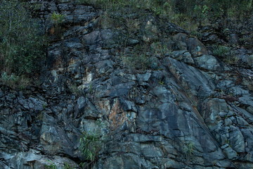 rock and stone texture background , mountain granite wall .