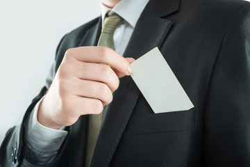 close up.businessman with a business card form