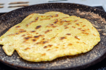 Cooking tortillas on a griddle