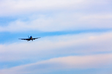 Fototapeta na wymiar a plane flying over the sky