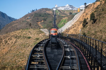 transportations train on parallel railroad , fansipan mountain at sapa northern vietnam