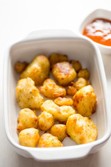Cauliflower popcorn, coated mini cauliflower florets in a light batter with a spicy Buffalo dip
