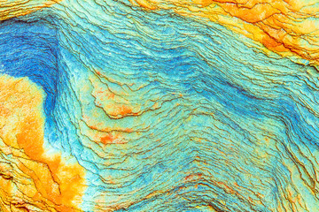 Colourful sedimentary rocks formed by the accumulation of sediments – natural rock layers backgrounds, patterns and textures - abstract graphic design – geology – nature formations