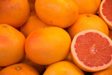 Group of fresh grapefruits for sale in the market