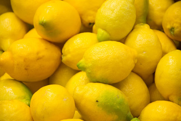  Group of fresh lemons for sale in the market