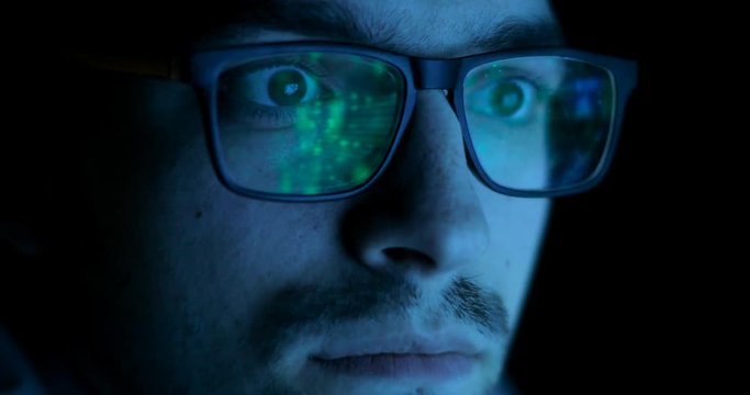 Man Wearing Glasses With Function Of Object Recognition. Shimmering Glass In The Glasses. Future Technologies Concept. Face Close-up.