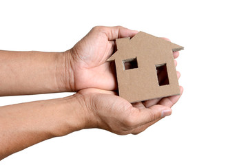 holding a cardboard house isolated on white background, crisis concept, homeless.
