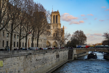 Fototapeta na wymiar Panoramic view of Paris and Notre-Dame Cathedral. Notre-Dame de Paris is a medieval Catholic cathedral on the Ile de la Cité in the fourth arrondissement of Paris