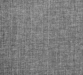 Fototapeta na wymiar Textured gray natural fabric . 