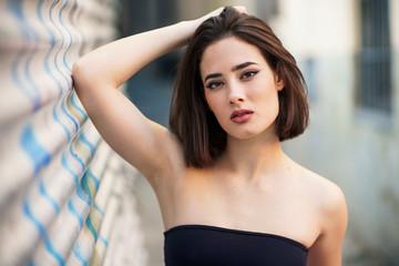 Portrait of young woman with bob hairdo