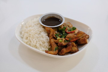 Boiled rice with beans on a white plate. Food photography