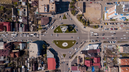 Top down view of urban road traffic, roundabout, junction route traffic
