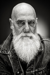 Obraz premium studio portrait of a senior hipster with a long white beard