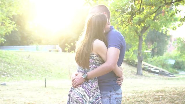 Real Time Woman Hugs And Kiss Man, Outdoors