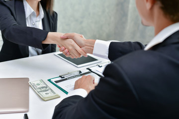Business concept. Businessmen are signing agreements. Businessmen are pleased to exchange between companies.