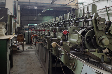 Old printing equipment. Dust and dirt indoors