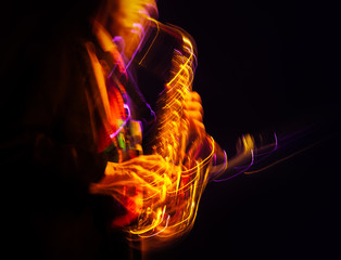 Saxophone player performing on stage
