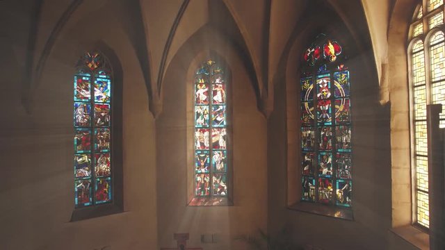 Colour windows in a church with sunshine