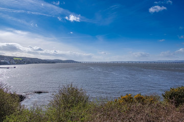 Beautiful Tay and the Tay Rail Bridge in Dundee with Clear blue Skys in Scotland