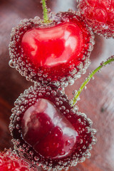 fresh red bubbly cherries and raspberries