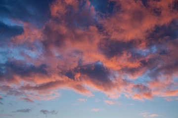 Dramatic torn dark clouds during the sunset_