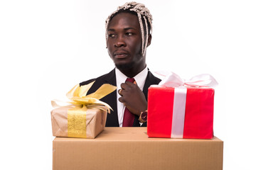 Young african businessman make decision from two gift boxes isolated on white background