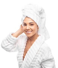 Young woman in a bathrobe and towel on her head
