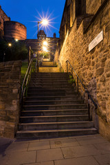Nightscape of steps in streets of Edinburgh with starburst lights