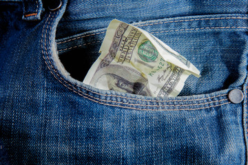 Last crumbled one hundred US Dollar in jeans pocket as symbol of poverty and bankruptcy. Not enough...