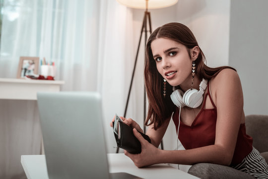 Teenager Girl Spending Money On Online Shopping