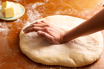Food bakery concept making bread dought for Cinnamon Roll Braided Bread with copy space